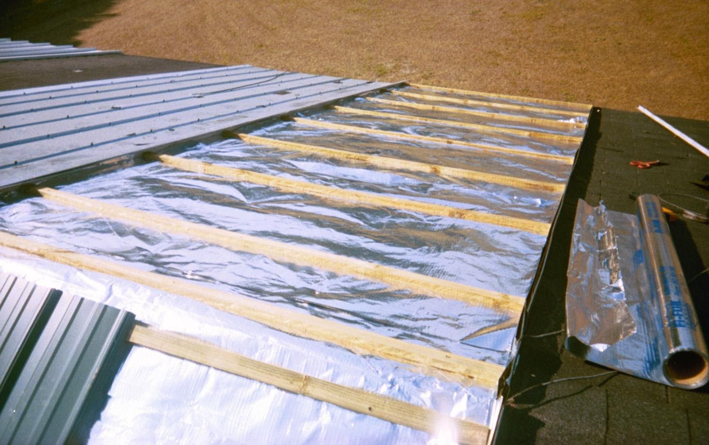 radiantbarrier23_crop1 a roof with radiant barrier and wood